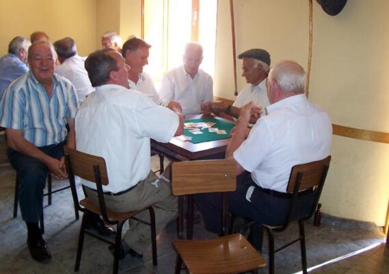 Grandparents playing cards